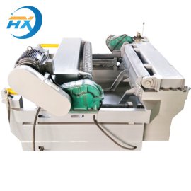 Spindle-less Log Debarker